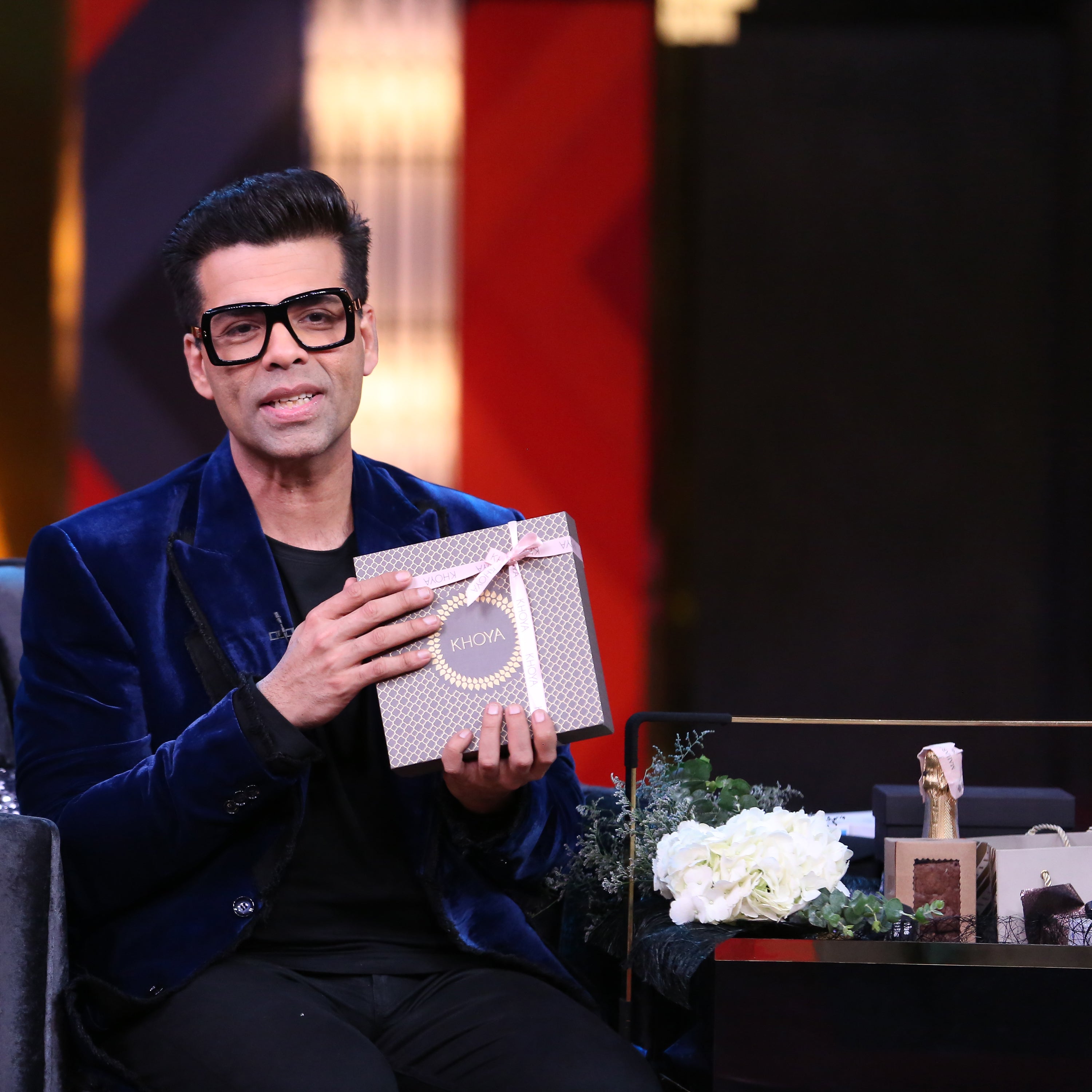 karan johar holding mithai box