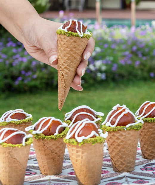 icecream cone with gulab jamun in it